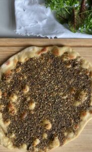 manouche za'atar which is a Lebanese flat bread baked with oregano, sumac and sesame seeds on top