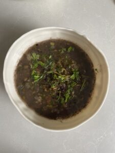 a bowl of sumac and herb soup